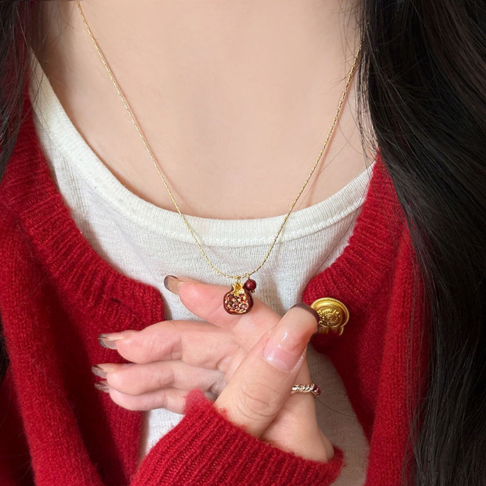 Pretty Gorgeous Stuff Pomegranate Necklace close-up pomegranate pendant detail