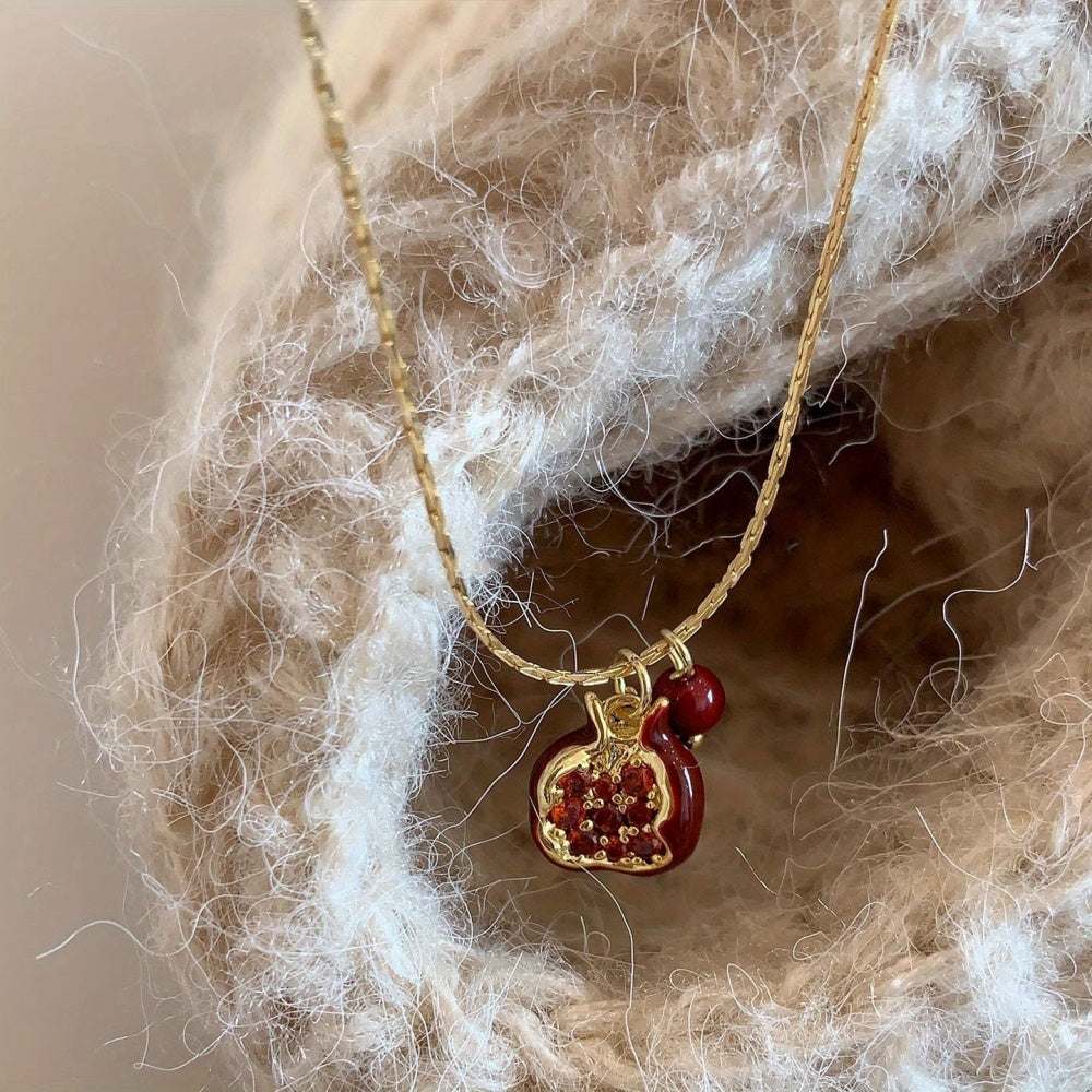 Pretty Gorgeous Stuff Pomegranate Necklace flat lay