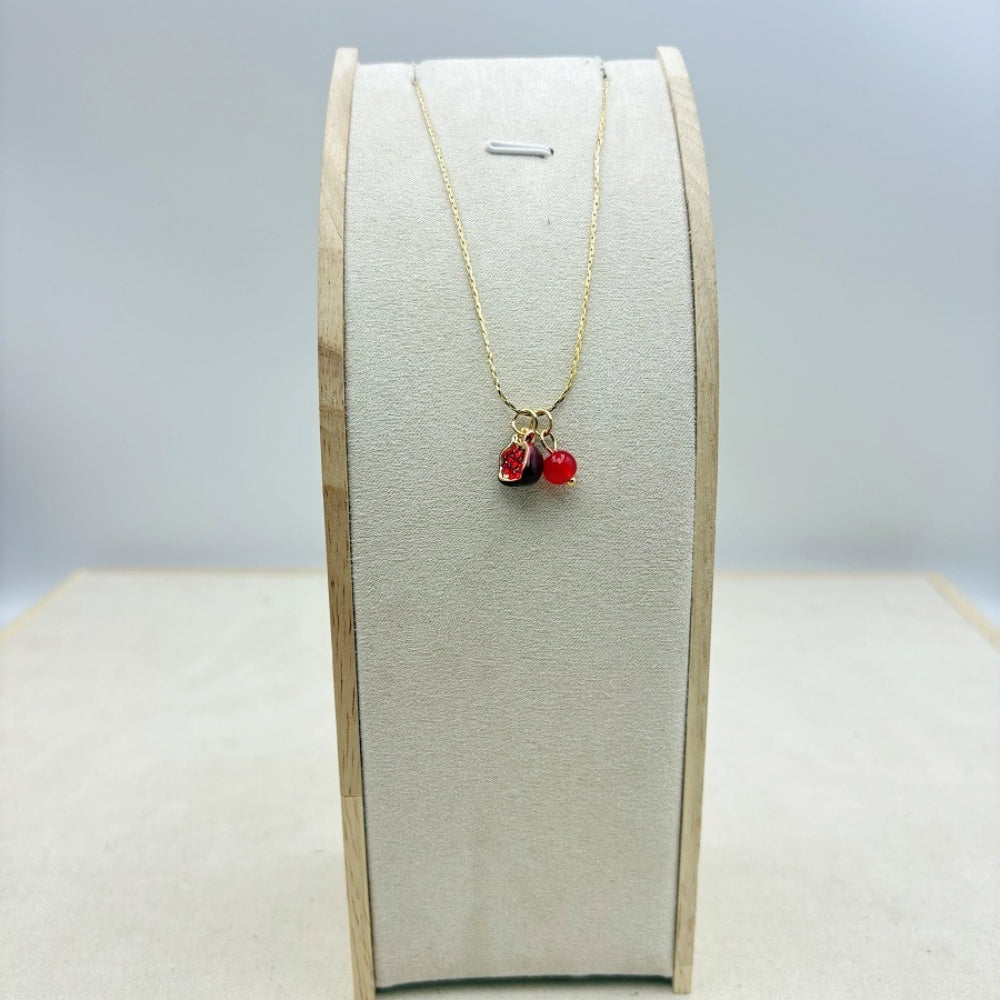 Pretty Gorgeous Stuff Pomegranate Necklace on display alternate view