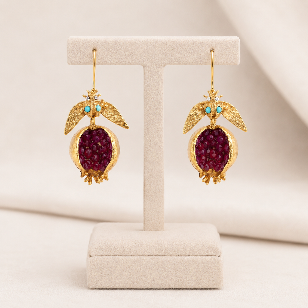 Pretty Gorgeous Stuff Pomegranate Drop Gem Earrings flat lay styled shot