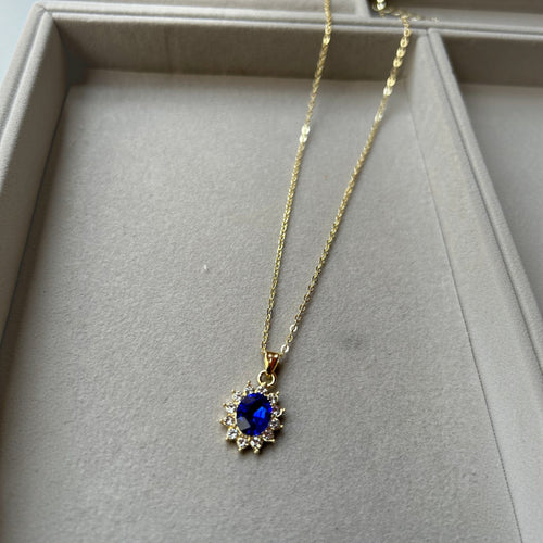 Pretty Gorgeous Stuff blue sun pendant necklace close-up