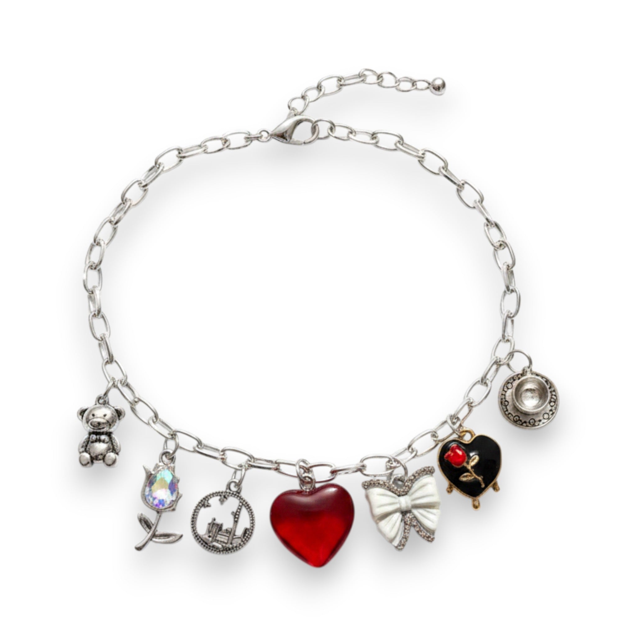 Pretty Gorgeous Stuff Sabrina charm necklace featuring silver chain with teddy bear, rose, heart, and bow charms.